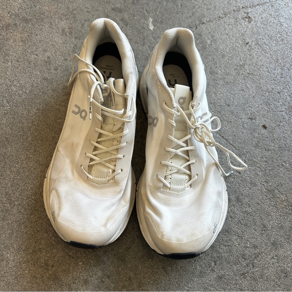 white On Cloudnova Form sneakers with a low-profile silhouette and mesh upper.